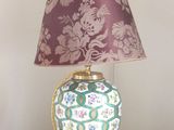 a lamp that is sitting on a table in a room
