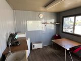a small room with a table and a chair