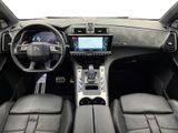 the interior of a car with a steering wheel, dashboard, and dash board