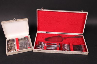 a silverware set in a red case with a spoon and fork