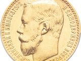l'image d'une pièce d'or sur laquelle figure le visage d'un homme