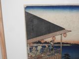a picture of a painting of people on a balcony