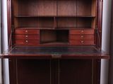 a wooden desk with drawers and drawers on it