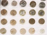 a lot of coins in a plastic bag on the table