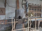 a machine that is sitting in a room with wood