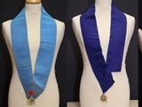 four different types of sashs on a mannequin stand