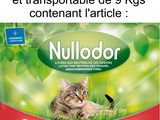 a picture of a cat sitting in a bag of cat litter
