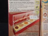 two boxes of donuts sitting on a table
