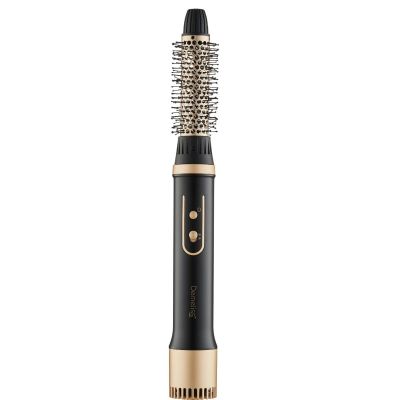 une brosse à cheveux noire et dorée avec un manche doré
