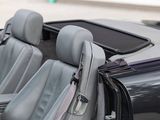 a close up of a car ' s interior with the door open