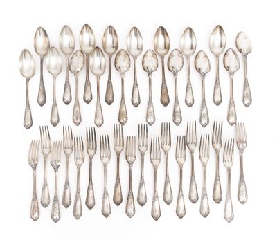a group of silver spoons and forks on a white background