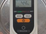 a close up of a digital device on a metal plate