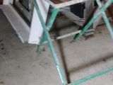 an image of a small table in a garage