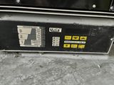a close up of a gas pump on the ground