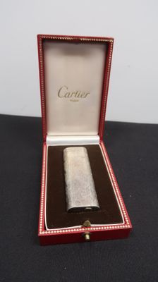 an image of a red box with a silver ring inside of it