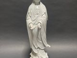 chinese white porcelain figure of a seated buddha on a pedestal