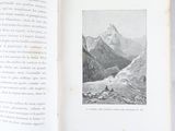 an open book with a picture of a mountain in the middle of it