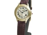 a close up of a wrist watch with roman numerals on it