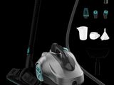 a close up of a steam cleaner and accessories on a black background