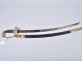 two swords, one with a gold handle and the other with a black handle