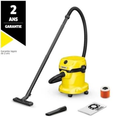 un aspirateur jaune avec une poignée noire et un cordon rouge