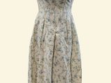 an image of a dress on a mannequin stand