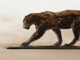a painting of a tiger walking on a table