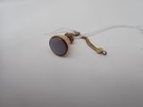 a small brown object on a white table