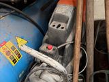 a pile of tools and tools that are on the floor