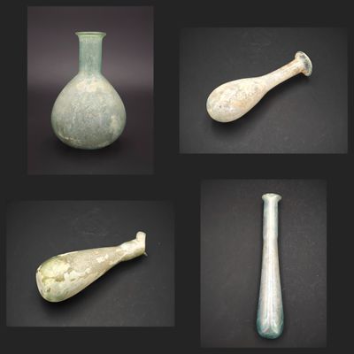 four different types of glass vases on a black background
