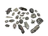 a lot of silver objects that are on a white surface