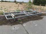 a metal frame that has been placed on the side of the road