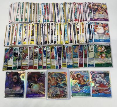 a lot of cards on the table with a lot of them