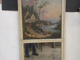 a man standing next to a painting on the wall