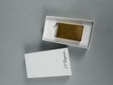 a box with a lighter inside of it on a table