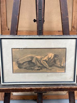 tableau représentant une femme allongée sur le ventre sur un chevalet en bois