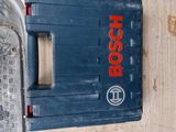a blue box with a red logo on it next to a blue box with a red logo on it