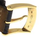 an image of a close up of a watch on a white surface