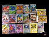 a lot of pokemon cards that are on the table