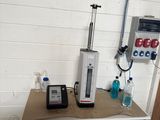 an image of a lab with a table and a machine