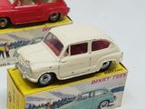 two toy cars that are sitting on top of a box