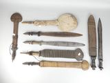 many different types of knives and knives on the table