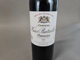 a bottle of wine that is sitting on a table