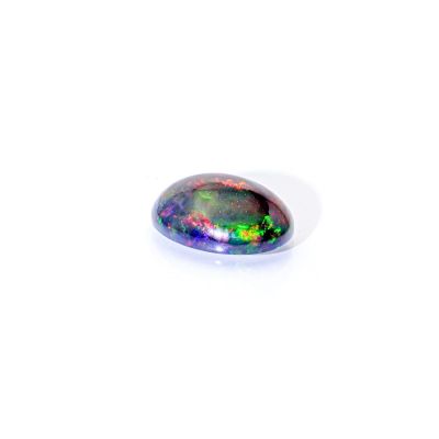 an oval black oplite gemstone with a rainbow hue