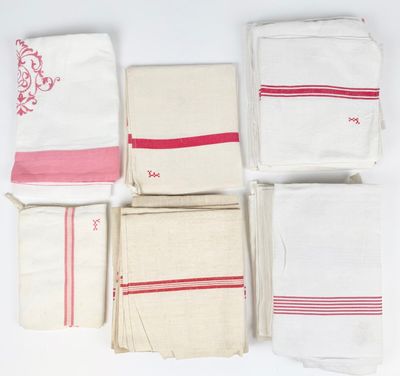 several different types of towels are laid out on a white surface