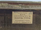 a picture of a wooden box with a label on it
