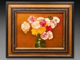 un tableau de fleurs dans un vase sur le mur