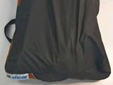 a bag that is sitting on top of a white table