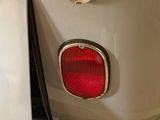 a close up of the tail light of a vintage car