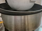 a large pot that is sitting on top of a stove